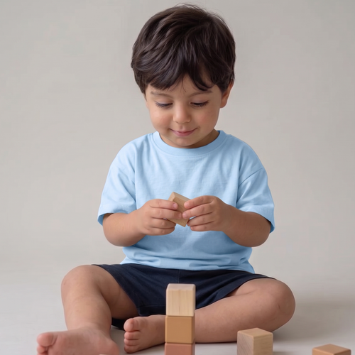 Child playing with wooden blocks on a plain background